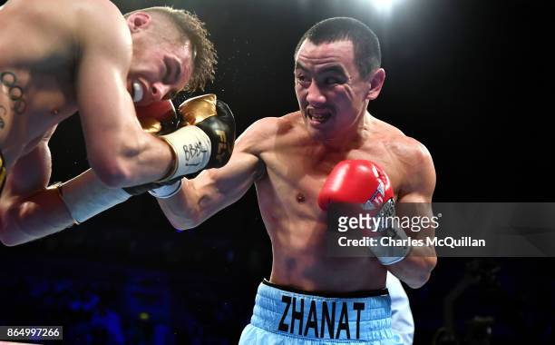 Ryan Burnett of Northern Ireland v Zhanat Zhakiyanov of Kazakhstan during their IBF, WBO and IBO World Bantamweight Championship bout at SSE Arena...