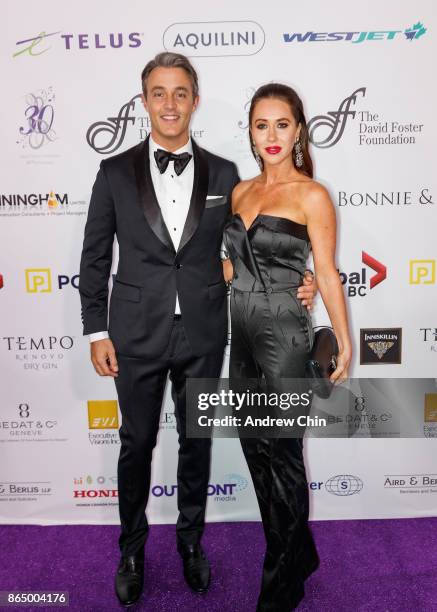 Ben Mulroney and Jessica Mulroney arrive for the David Foster Foundation Gala at Rogers Arena on October 21, 2017 in Vancouver, Canada.