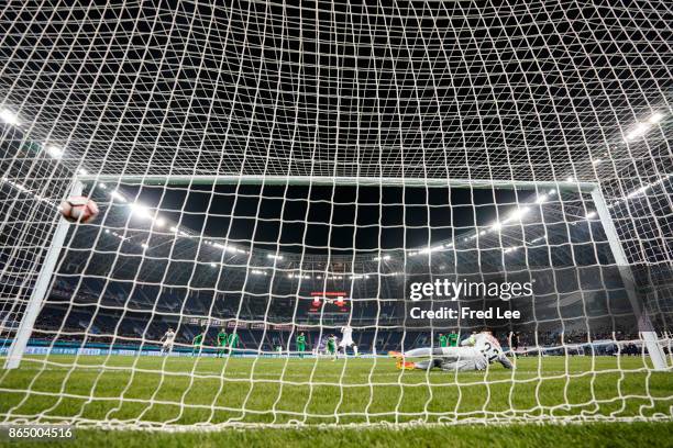 Mbaye Diagne of Tianjin Elion FC scores the first goal after penalty during the Chinese Super League match between Tianjin Elion FC and Beijing Guoan...