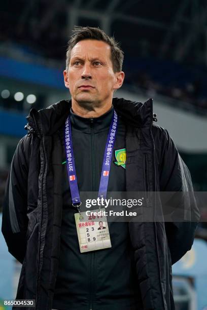 Head coach of Beijing Guoan Roger Schmidt reacts during the Chinese Super League match between Tianjin Elion FC and Beijing Guoan FC at Tianjin...