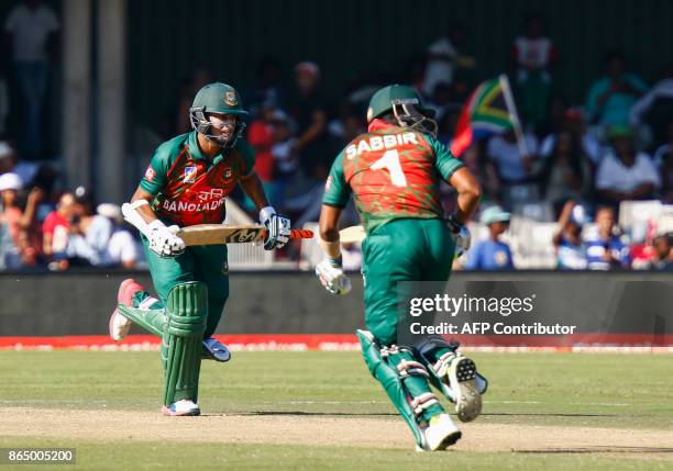 Bangladesh's Shakib Al Hasan and Sabbir Rahman cross for a single during their ODI One-Day International match against South Africa at the Buffalo...
