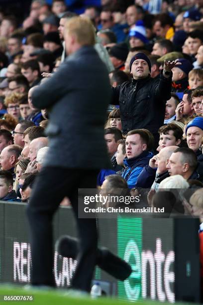 An Everton fan gestures towards manager Ronald Koeman during the Premier League match between Everton and Arsenal at Goodison Park on October 22,...