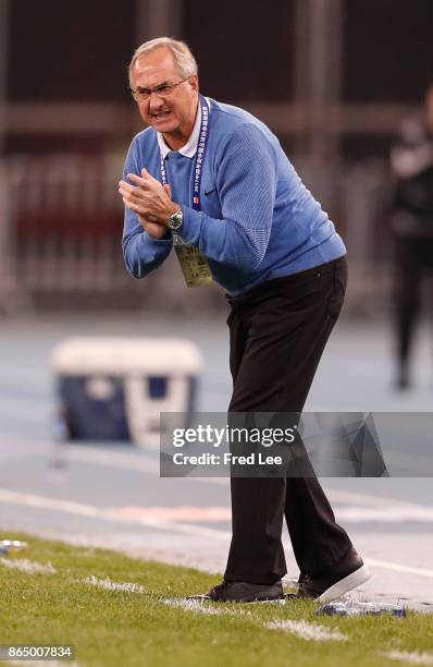 Head coach of Tianjin Elion FC Uli Stielike reacts during the Chinese Super League match between Tianjin Elion FC and Beijing Guoan FC at Tianjin...