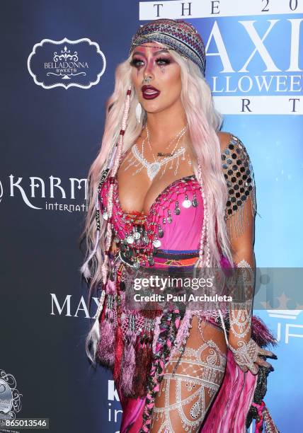 Singer Aubrey O'Day attends the 2017 Maxim Halloween party at Los Angeles Center Studios on October 21, 2017 in Los Angeles, California.
