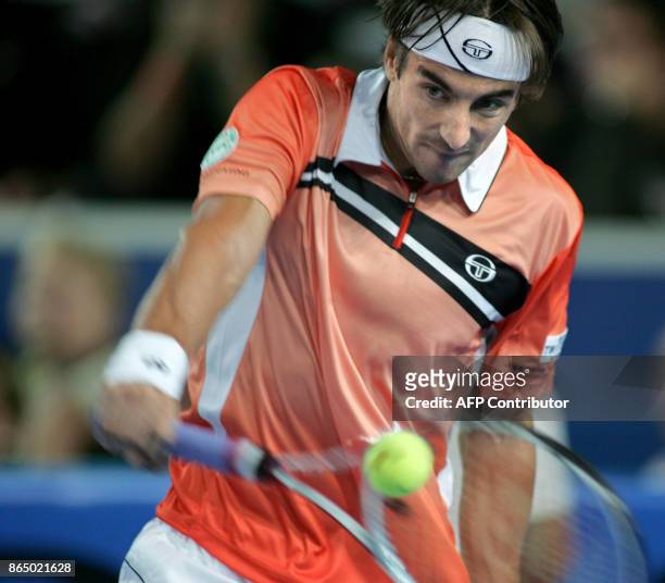 Tommy Robredo of Spain returns the ball to Andy Murray of Britain during the Moselle Tennis Open final match, 07 October 2007 in Metz. Robredo won...