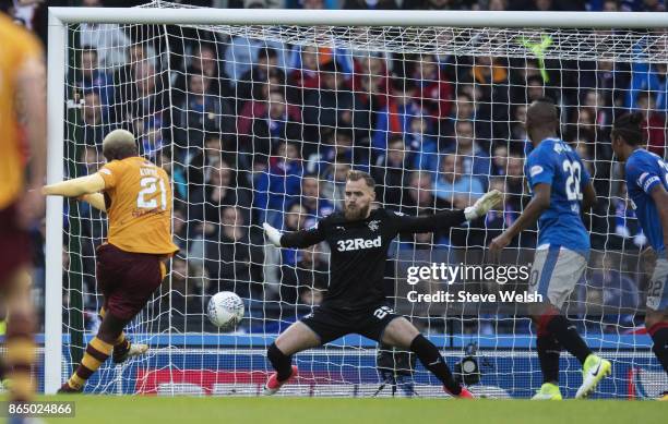 Cedric Kipre of Motherwell has his shot saved well by Jak Alnwick of Rangers during the Betfred Cup Semi Final at Hampden Park on October 22, 2017 in...