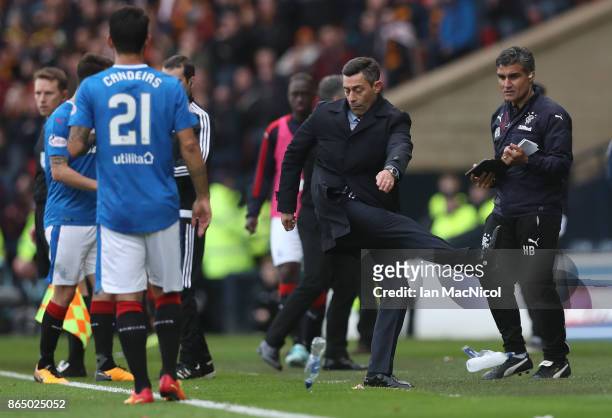 Rangers manager Pedro Caixinha kicks out at a water bottle during the Betfred League Cup Semi Final between Rangers and Motherwell at Hampden Park on...