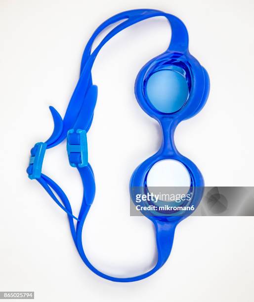 close-up of blue swimming goggles - swimming goggles stock pictures, royalty-free photos & images