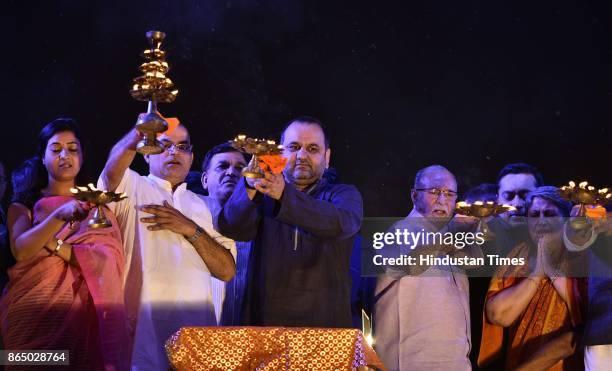 Delhi Lt. Governor Delhi LG Anil Baijal and BJP leader Mahesh Giri, AAP leader Alka Lamba seen during the Yamuna Aarti at Kudsia Ghat, on October 21,...