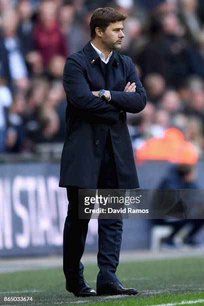 Mauricio Pochettino, Manager of Tottenham Hotspur looks on during the Premier League match between Tottenham Hotspur and Liverpool at Wembley Stadium...