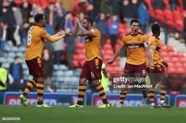 Charles Dunne, Peter Hartley and Carl McHugh of Motherwell reacts at full time during the Betfred League Cup Semi Final between Rangers and...