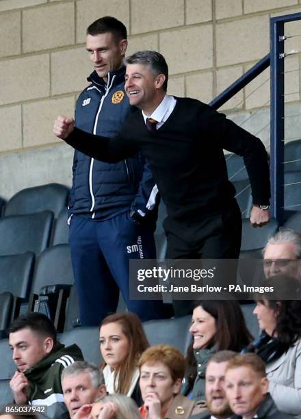 Motherwell manager Stephen Robinson celebrates his teams win from the stand as the final whistle is blown at the Betfred Cup, semi-final match at...