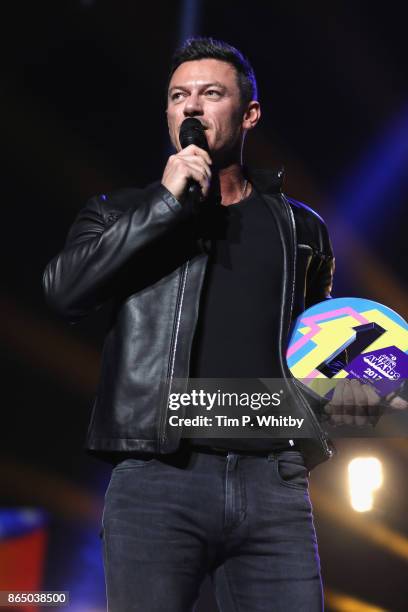 Luke Evans accepts the award for Best Film for 'Beauty and the Beast' on stage during the BBC Radio 1 Teen Awards 2017 at Wembley Arena on October...