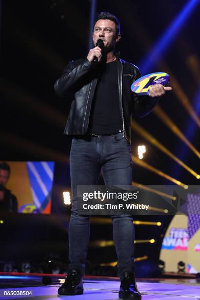 Luke Evans accepts the award for Best Film for 'Beauty and the Beast' on stage during the BBC Radio 1 Teen Awards 2017 at Wembley Arena on October...