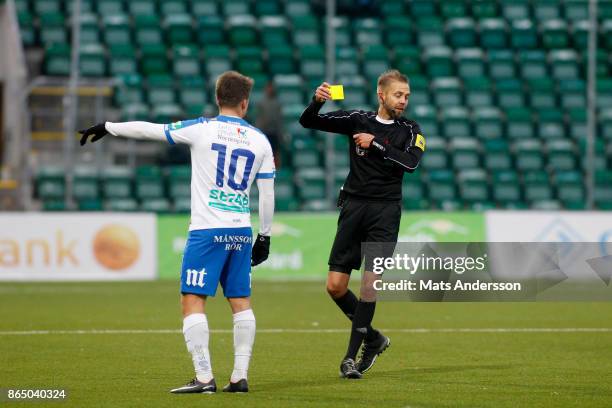 Simon Skrabb of IFK Norrkoping is shown a yellow card during the Allsvenskan match between GIF Sundsvall and IFK Norrkoping at Idrottsparken on...