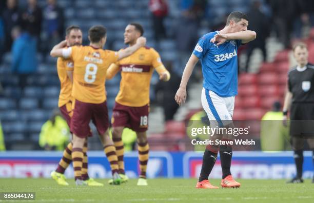 Rangers Dorrans holds his head as Motherwell start their celebrations after dumping Rangers out of the Betfred Cup at Hampden Park on October 22,...