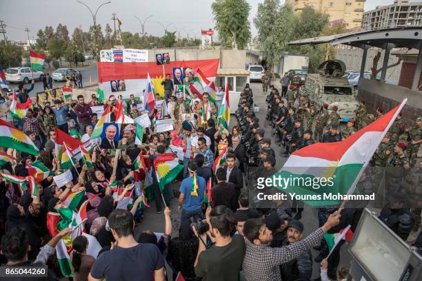 Hundreds of people protest outisde the Russian consulate on October 22, 2017 in Erbil, Iraq. Kurds claim they are under attack by Shiite Hashd...