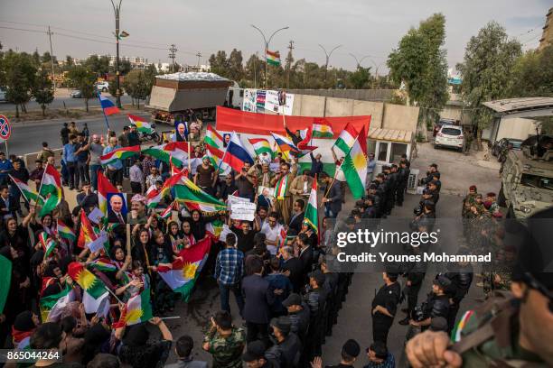 Hundreds of people protest outisde the Russian consulate on October 22, 2017 in Erbil, Iraq. Kurds claim they are under attack by Shiite Hashd...