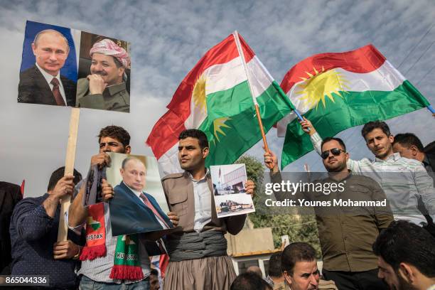 Hundreds of people protest outisde the Russian consulate on October 22, 2017 in Erbil, Iraq. Kurds claim they are under attack by Shiite Hashd...