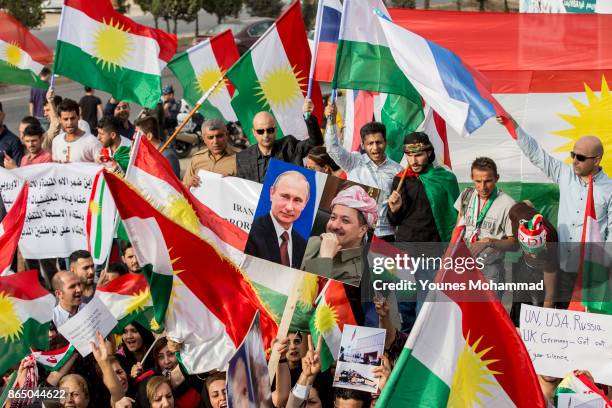 Hundreds of people protest outisde the Russian consulate on October 22, 2017 in Erbil, Iraq. Kurds claim they are under attack by Shiite Hashd...