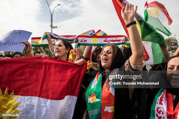 Hundreds of people protest outisde the Russian consulate on October 22, 2017 in Erbil, Iraq. Kurds claim they are under attack by Shiite Hashd...