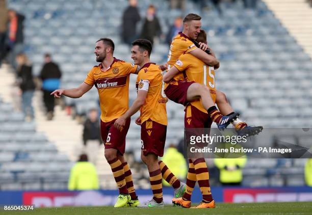 Motherwell's players celebrate their win after the Betfred Cup, semi-final match at Hampden Park, Glasgow.