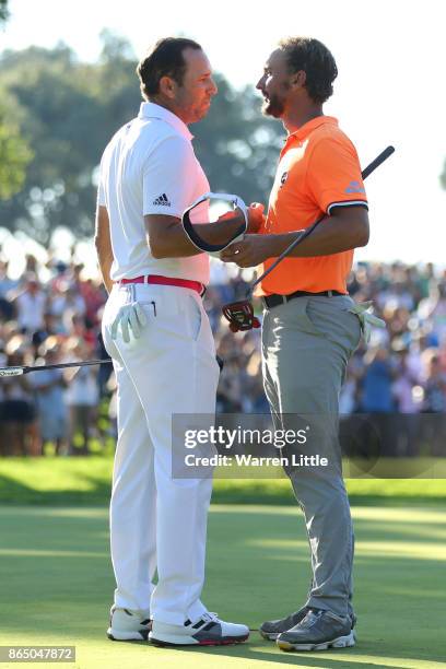 Sergio Garcia of Spain is congratulated on his victory on the 18th green by Joost Luiten of the Netherlands during the final round of of the...