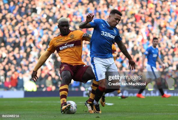 James Tavernier of Rangers vies with Cedric Kipre of Motherwell during the Betfred League Cup Semi Final between Rangers and Motherwell at Hampden...