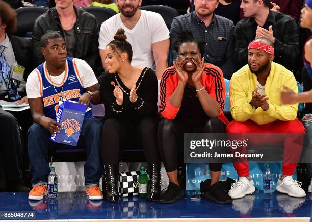 Tracy Morgan, Megan Wollover, Leslie Jones and guest attend Detroit Pistons Vs. New York Knicks game at Madison Square Garden on October 21, 2017 in...