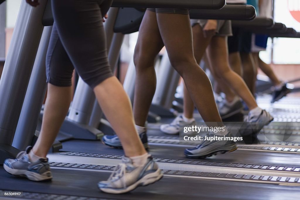 People on treadmills in gym