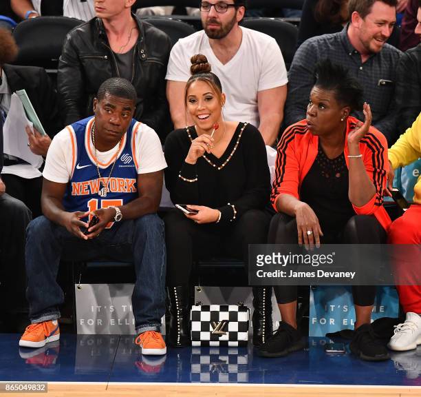 Tracy Morgan, Megan Wollover and Leslie Jones attend Detroit Pistons Vs. New York Knicks game at Madison Square Garden on October 21, 2017 in New...
