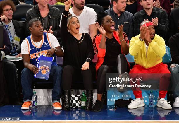 Tracy Morgan, Megan Wollover, Leslie Jones and guest attend Detroit Pistons Vs. New York Knicks game at Madison Square Garden on October 21, 2017 in...