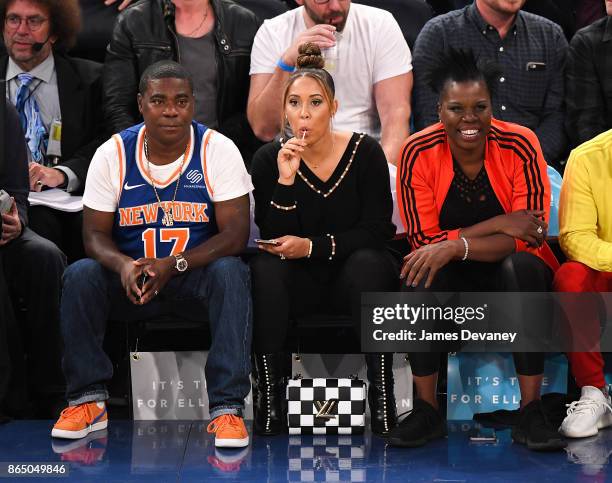 Tracy Morgan, Megan Wollover and Leslie Jones attend Detroit Pistons Vs. New York Knicks game at Madison Square Garden on October 21, 2017 in New...