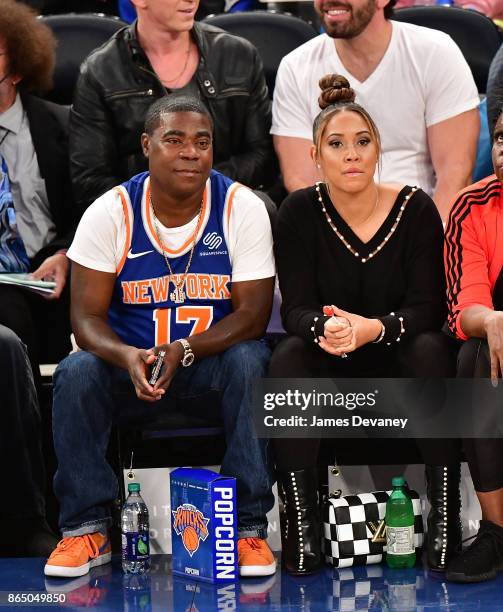 Tracy Morgan and Megan Wollover attend Detroit Pistons Vs. New York Knicks game at Madison Square Garden on October 21, 2017 in New York City.