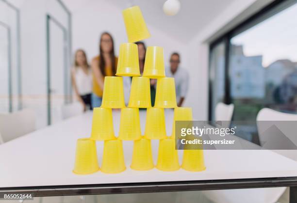 office work - beer pong stock pictures, royalty-free photos & images