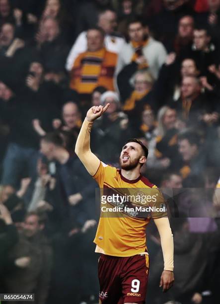 Louis Moult of Motherwell celebrates after he scores the opening goal during the Betfred League Cup Semi Final between Rangers and Motherwell at...