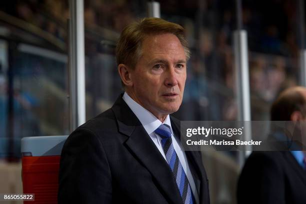 Portland Winterhawks' head coach Mike Johnston stands on the bench against the Kelowna Rockets at Prospera Place on October 20, 2017 in Kelowna,...