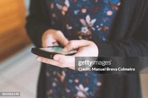Woman using her mobile phone Woman using her mobile phone