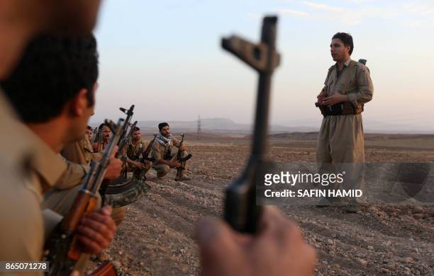 Iranian Kurdish Peshmerga, members of the Iranian Kurdistan Democratic Party , take part in routine military exercise in Koya, 100 kms east of Arbil,...