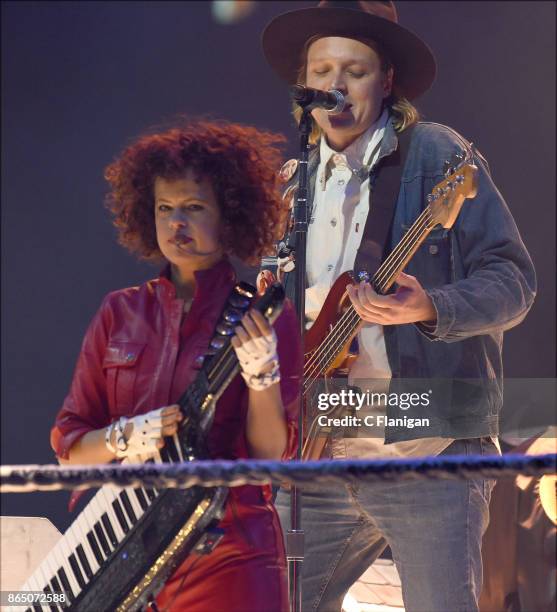 Win Butler and Regine Chassagne of Arcade Fire perform during the ÔInfinite ContentÕ tour at ORACLE Arena on October 21, 2017 in Oakland, California.