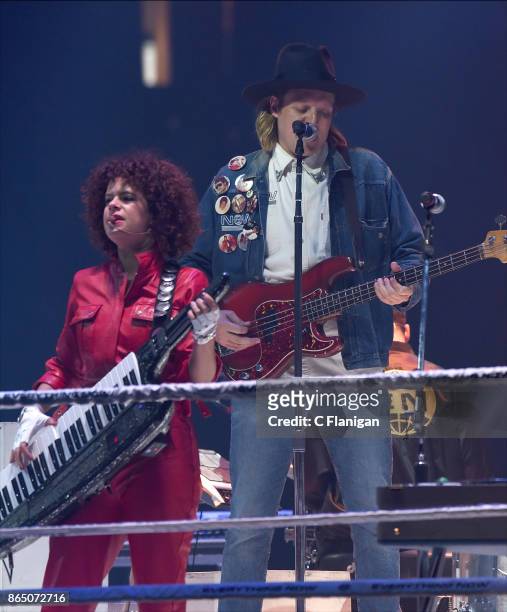 Win Butler and Regine Chassagne of Arcade Fire perform during the ÔInfinite ContentÕ tour at ORACLE Arena on October 21, 2017 in Oakland, California.