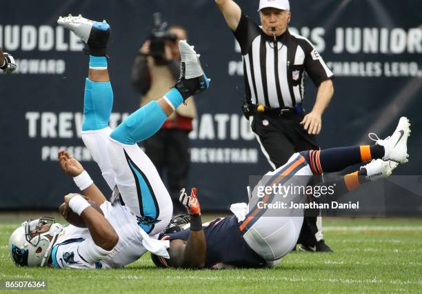 Quarterback Cam Newton of the Carolina Panthers is sacked by Danny Trevathan of the Chicago Bears in the first quarter at Soldier Field on October...