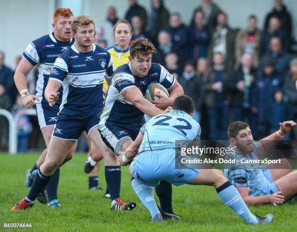 Yorkshire Carnegie's George Watkins is tackled by London Scottish's Jake Sharp during the British and Irish Cup Pool 3 match between Yorkshire...