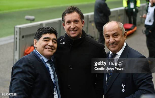 Diego Maradona legend of football and Ossie Ardiles legend of Tottenham Hotspur with Robbie Fowler legend of Liverpool during the Premier League...