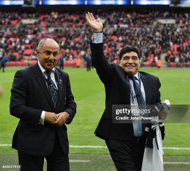 Diego Maradona legend of football with Ossie Ardiles legend of Tottenham Hotspur during the Premier League match between Tottenham Hotspur and...