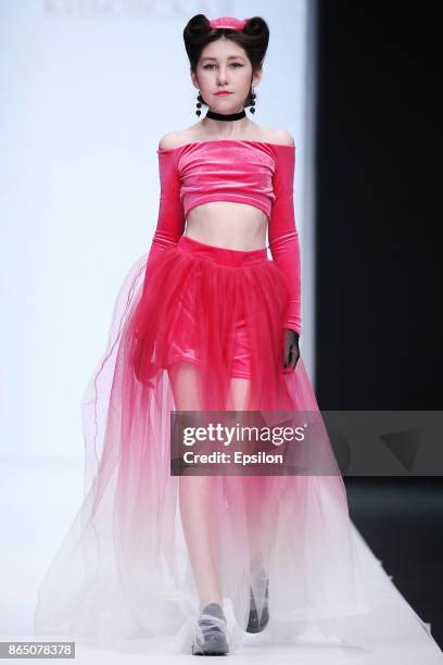 Model walks the runway at the KIBOVSKAYA&PABLOSKY fashion show during day two of Mercedes Benz Fashion Week Russia S/S 2018 at Manege on October 22,...