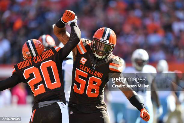 Briean Boddy-Calhoun and Christian Kirksey of the Cleveland Browns celebrate after making a third down stop in the first quarter against the...