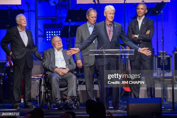 Former US Presidents, Jimmy Carter, George H. W. Bush,George W. Bush, Bill Clinton and Barack Obama attend the Hurricane Relief concert in College...