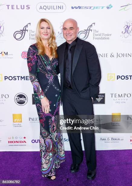 Steffi Graf and Andre Agassi arrive for the David Foster Foundation Gala at Rogers Arena on October 21, 2017 in Vancouver, Canada.