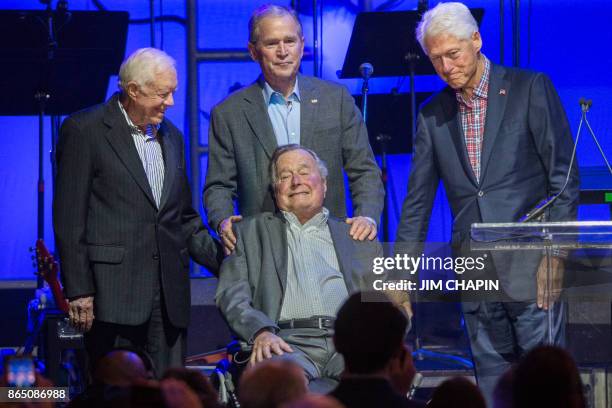 Former US Presidents, Jimmy Carter, George H. W. Bush, George W. Bush, and Bill Clinton attend the Hurricane Relief concert in College Station,...